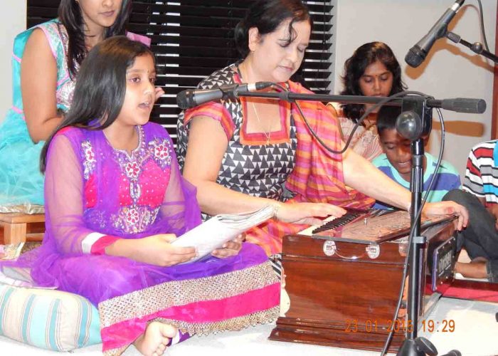 Lizelle rendering bhajans at sarawathi pooja