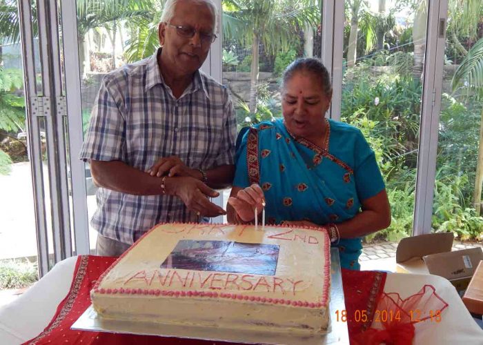 Mr and Mrs Komal lighting the candles for the SRKT 2nd Anniversa